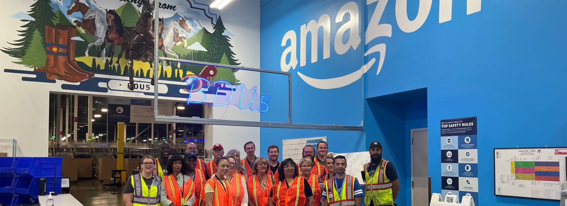 Group picture of a recent Amazon Facility visit